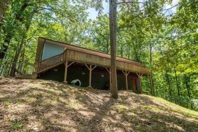 Nestled in a peaceful, wooded setting of Diamondhead Golf & on Diamondhead Golf and Country Club in Arkansas - for sale on GolfHomes.com, golf home, golf lot