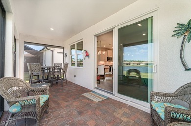 Featuring a TILE ROOF, ELEGANT STONE VENEER, IMPACT RESISTANT on Herons Glen Golf and Country Club in Florida - for sale on GolfHomes.com, golf home, golf lot