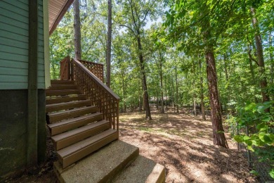 Nestled in a peaceful, wooded setting of Diamondhead Golf & on Diamondhead Golf and Country Club in Arkansas - for sale on GolfHomes.com, golf home, golf lot