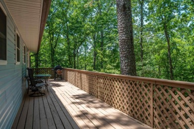 Nestled in a peaceful, wooded setting of Diamondhead Golf & on Diamondhead Golf and Country Club in Arkansas - for sale on GolfHomes.com, golf home, golf lot