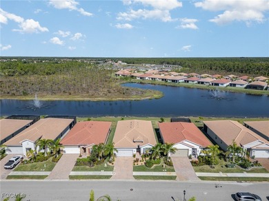Featuring a TILE ROOF, ELEGANT STONE VENEER, IMPACT RESISTANT on Herons Glen Golf and Country Club in Florida - for sale on GolfHomes.com, golf home, golf lot