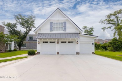 This stunning 3BR 3.5BA coastal home located on highly desired on North River Club in North Carolina - for sale on GolfHomes.com, golf home, golf lot