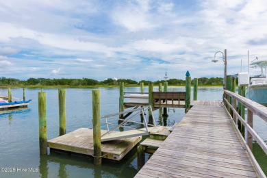 This stunning 3BR 3.5BA coastal home located on highly desired on North River Club in North Carolina - for sale on GolfHomes.com, golf home, golf lot
