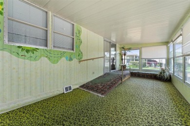 MOVE-IN READY! 2 BED/2 BATH COZY RETREAT - TWO FLORIDA ROOMS - on Bay Tree Golf Course in Florida - for sale on GolfHomes.com, golf home, golf lot