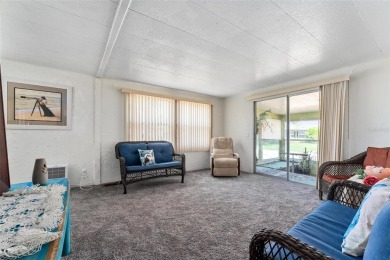 MOVE-IN READY! 2 BED/2 BATH COZY RETREAT - TWO FLORIDA ROOMS - on Bay Tree Golf Course in Florida - for sale on GolfHomes.com, golf home, golf lot