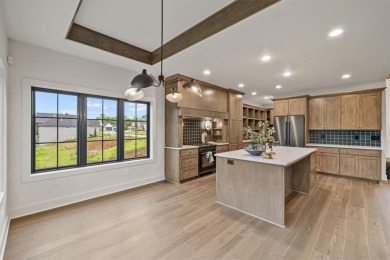 THE ELM by STONELEAF HOMES features a Wine Room, Wet Bar, Den on Shoal Creek Golf Course in Missouri - for sale on GolfHomes.com, golf home, golf lot