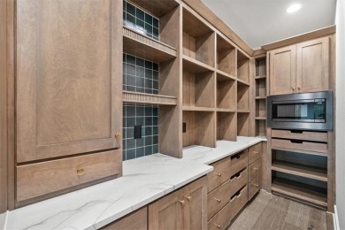 THE ELM by STONELEAF HOMES features a Wine Room, Wet Bar, Den on Shoal Creek Golf Course in Missouri - for sale on GolfHomes.com, golf home, golf lot