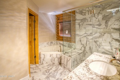 Nestled in the desirable gated community of The Timbers within on Pinetop Lakes Golf and Country Club in Arizona - for sale on GolfHomes.com, golf home, golf lot