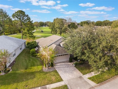 Imagine enjoying a cup of coffee on your back patio, looking out on Country Club of Mount Dora in Florida - for sale on GolfHomes.com, golf home, golf lot