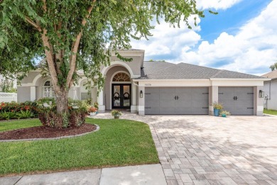 Experience refined Florida living at its finest in this on The Eagles Golf Course and Club in Florida - for sale on GolfHomes.com, golf home, golf lot