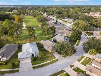 Imagine enjoying a cup of coffee on your back patio, looking out on Country Club of Mount Dora in Florida - for sale on GolfHomes.com, golf home, golf lot