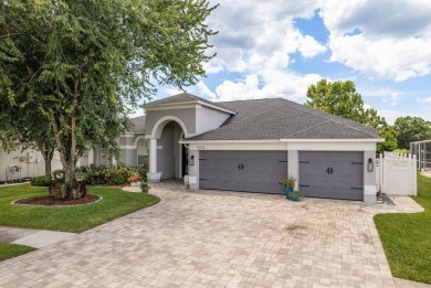 Experience refined Florida living at its finest in this on The Eagles Golf Course and Club in Florida - for sale on GolfHomes.com, golf home, golf lot