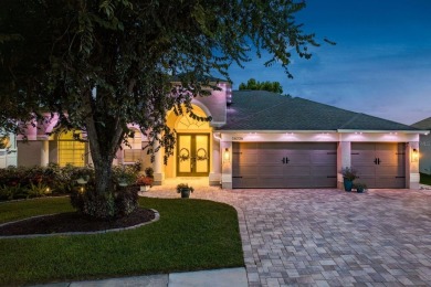 Experience refined Florida living at its finest in this on The Eagles Golf Course and Club in Florida - for sale on GolfHomes.com, golf home, golf lot