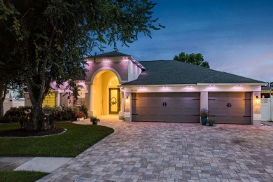 Experience refined Florida living at its finest in this on The Eagles Golf Course and Club in Florida - for sale on GolfHomes.com, golf home, golf lot