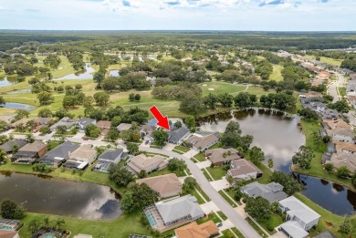 Experience refined Florida living at its finest in this on The Eagles Golf Course and Club in Florida - for sale on GolfHomes.com, golf home, golf lot