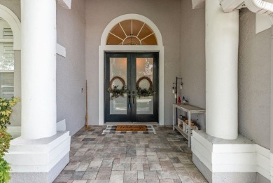 Experience refined Florida living at its finest in this on The Eagles Golf Course and Club in Florida - for sale on GolfHomes.com, golf home, golf lot