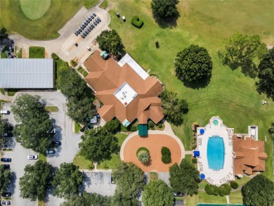 Imagine enjoying a cup of coffee on your back patio, looking out on Country Club of Mount Dora in Florida - for sale on GolfHomes.com, golf home, golf lot