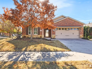 Nestled on a coveted corner lot and backing up to the lush on Frisco Lakes Golf Course in Texas - for sale on GolfHomes.com, golf home, golf lot