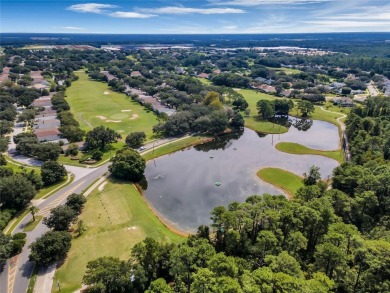 Imagine enjoying a cup of coffee on your back patio, looking out on Country Club of Mount Dora in Florida - for sale on GolfHomes.com, golf home, golf lot