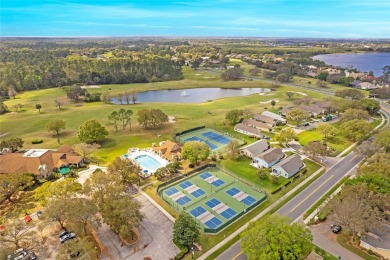 Imagine enjoying a cup of coffee on your back patio, looking out on Country Club of Mount Dora in Florida - for sale on GolfHomes.com, golf home, golf lot