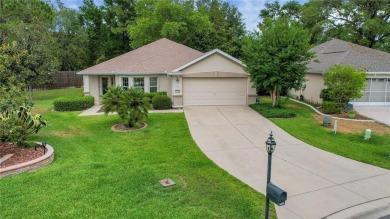 A MUST SEE! This lovely Challedon model BLOCK/STUCCO home in on Eagle Ridge At Spruce Creek Country Club in Florida - for sale on GolfHomes.com, golf home, golf lot