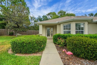 A MUST SEE! This lovely Challedon model BLOCK/STUCCO home in on Eagle Ridge At Spruce Creek Country Club in Florida - for sale on GolfHomes.com, golf home, golf lot