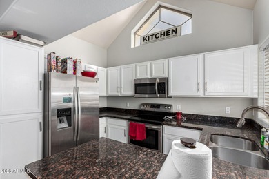 Become the proud owner of this 2-bed, 2-bath townhome in the on Palm Valley Golf Club  in Arizona - for sale on GolfHomes.com, golf home, golf lot