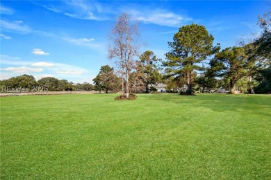 Discover the perfect canvas for your dream home on this stunning on Oldfield Golf Club in South Carolina - for sale on GolfHomes.com, golf home, golf lot