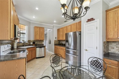 Stunning 2-bedroom, 2-bath plus DEN Hemingway model with on Poinciana Golf Club in Florida - for sale on GolfHomes.com, golf home, golf lot