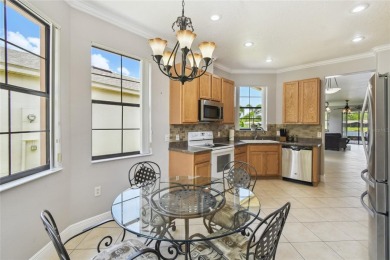 Stunning 2-bedroom, 2-bath plus DEN Hemingway model with on Poinciana Golf Club in Florida - for sale on GolfHomes.com, golf home, golf lot