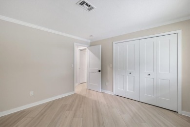 Rarely available 3-bed, 2-bath home near prestigious Vero Beach on Vero Beach Country Club in Florida - for sale on GolfHomes.com, golf home, golf lot