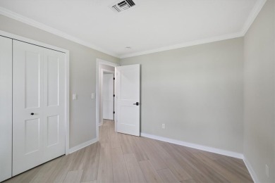 Rarely available 3-bed, 2-bath home near prestigious Vero Beach on Vero Beach Country Club in Florida - for sale on GolfHomes.com, golf home, golf lot