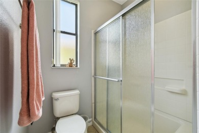 Stunning 2-bedroom, 2-bath plus DEN Hemingway model with on Poinciana Golf Club in Florida - for sale on GolfHomes.com, golf home, golf lot