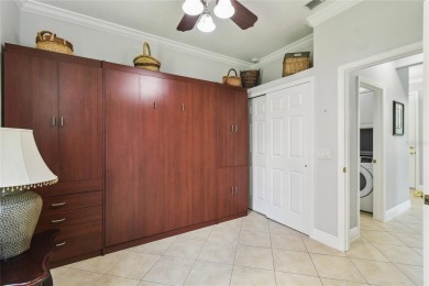 Stunning 2-bedroom, 2-bath plus DEN Hemingway model with on Poinciana Golf Club in Florida - for sale on GolfHomes.com, golf home, golf lot