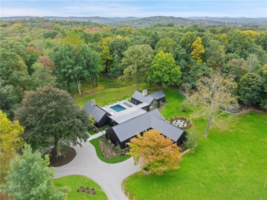 EAST WINDS. Set in the middle of lush, level lawns, 76 East on Waccabuc Country Club in New York - for sale on GolfHomes.com, golf home, golf lot