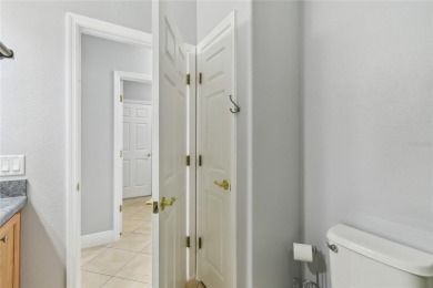 Stunning 2-bedroom, 2-bath plus DEN Hemingway model with on Poinciana Golf Club in Florida - for sale on GolfHomes.com, golf home, golf lot