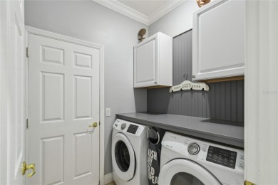 Stunning 2-bedroom, 2-bath plus DEN Hemingway model with on Poinciana Golf Club in Florida - for sale on GolfHomes.com, golf home, golf lot