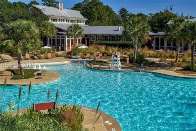 Discover the perfect canvas for your dream home on this stunning on Oldfield Golf Club in South Carolina - for sale on GolfHomes.com, golf home, golf lot