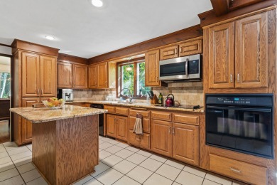 Beautifully updated 2 story on a wooded 2.7 acre lot with a on Thornberry Creek At Oneida in Wisconsin - for sale on GolfHomes.com, golf home, golf lot