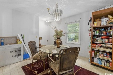 Discover the potential of this 3-bedroom, 2-bath home perfectly on Sea Trail Golf Resort in North Carolina - for sale on GolfHomes.com, golf home, golf lot