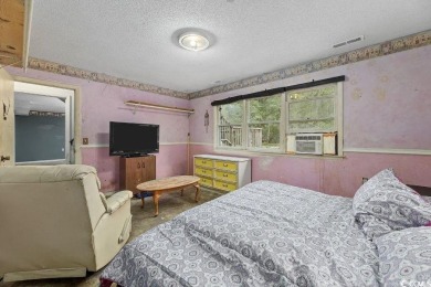 Discover the potential of this 3-bedroom, 2-bath home perfectly on Sea Trail Golf Resort in North Carolina - for sale on GolfHomes.com, golf home, golf lot
