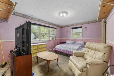 Discover the potential of this 3-bedroom, 2-bath home perfectly on Sea Trail Golf Resort in North Carolina - for sale on GolfHomes.com, golf home, golf lot