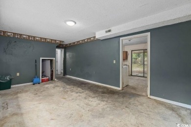 Discover the potential of this 3-bedroom, 2-bath home perfectly on Sea Trail Golf Resort in North Carolina - for sale on GolfHomes.com, golf home, golf lot