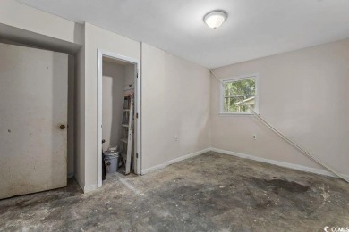 Discover the potential of this 3-bedroom, 2-bath home perfectly on Sea Trail Golf Resort in North Carolina - for sale on GolfHomes.com, golf home, golf lot