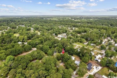 Discover the potential of this 3-bedroom, 2-bath home perfectly on Sea Trail Golf Resort in North Carolina - for sale on GolfHomes.com, golf home, golf lot