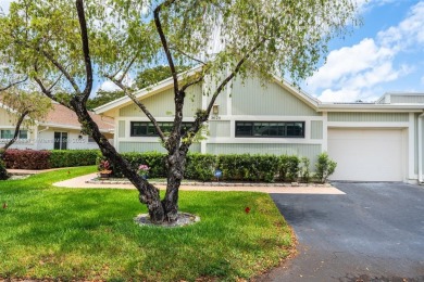 Welcome to this beautifully updated 3 bed, 2 bath condo villa on Grande Oaks Golf Club in Florida - for sale on GolfHomes.com, golf home, golf lot