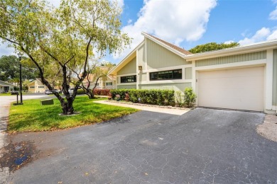 Welcome to this beautifully updated 3 bed, 2 bath condo villa on Grande Oaks Golf Club in Florida - for sale on GolfHomes.com, golf home, golf lot