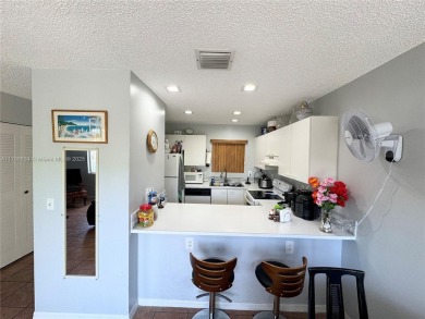Townhouse Style Condo in Paseo Real Community in Kendall, this on Miccosukee Golf and Country Club in Florida - for sale on GolfHomes.com, golf home, golf lot