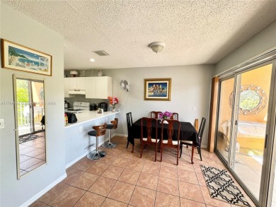 Townhouse Style Condo in Paseo Real Community in Kendall, this on Miccosukee Golf and Country Club in Florida - for sale on GolfHomes.com, golf home, golf lot