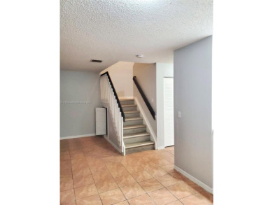 Townhouse Style Condo in Paseo Real Community in Kendall, this on Miccosukee Golf and Country Club in Florida - for sale on GolfHomes.com, golf home, golf lot